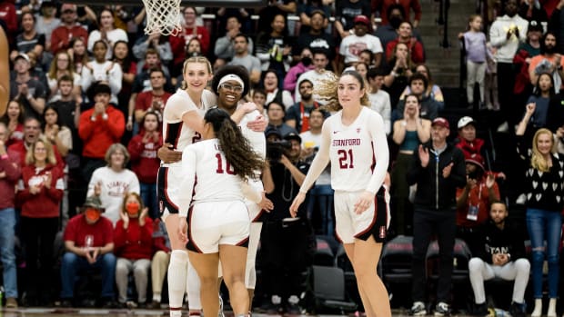 Stanford, California, USA; Stanford Cardinal forward Francesca Belibi (5) and guard Haley Jones (30) and forward Cameron Brink (22) and forward Brooke Demetre (21) celebrate their 71-66 victory over UCLA Bruins at Maples Pavilion.